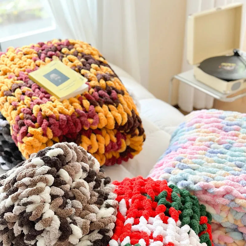 Thick striped chenille cover blanket in a choice of four colours, shown with dimensions of 130 by 170 centimetres.