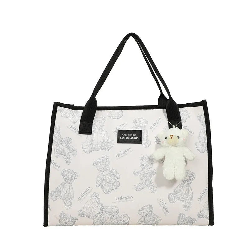 Printed canvas tote bag with rhombus pattern and sandwich pocket design in black colour