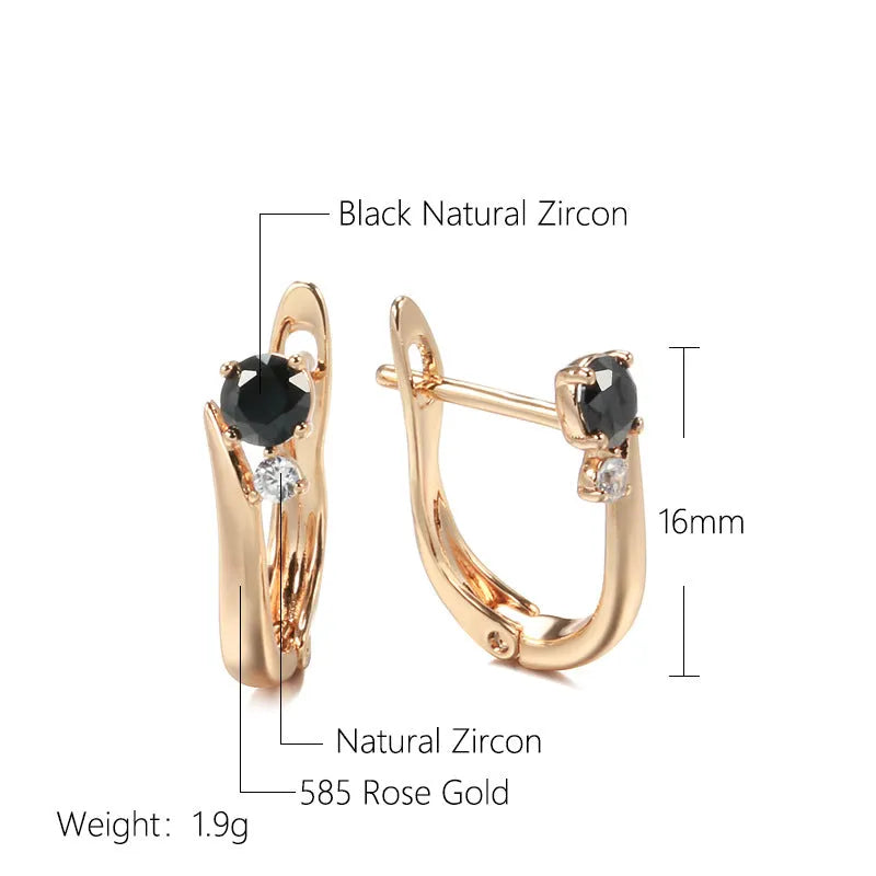 Gold geometric drop earrings with black agate stone accents and retro design