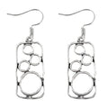 Geometric round ring earrings with irregular square details in antique silver zinc alloy