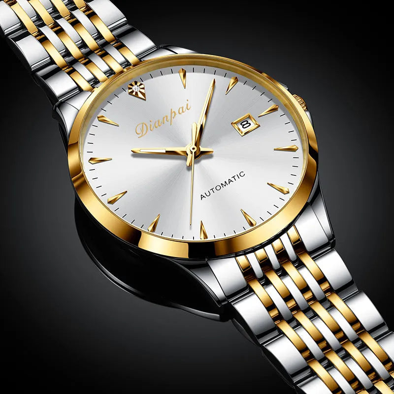 Men's simple dial automatic watch with stainless steel bracelet on a wrist.