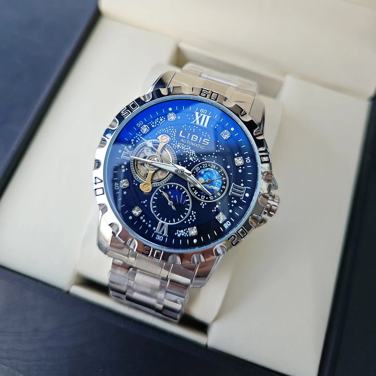 Men's silver case automatic mechanical watch with luminous hands, waterproof starry dial, and genuine leather strap