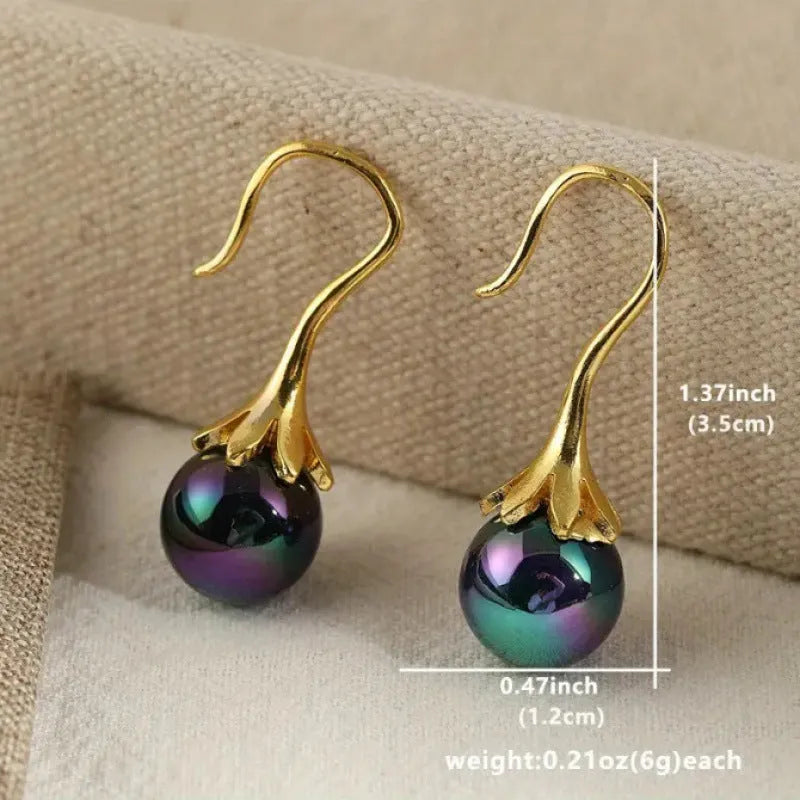 Gold electroplated retro fashion women's earrings with personalised creative design elements