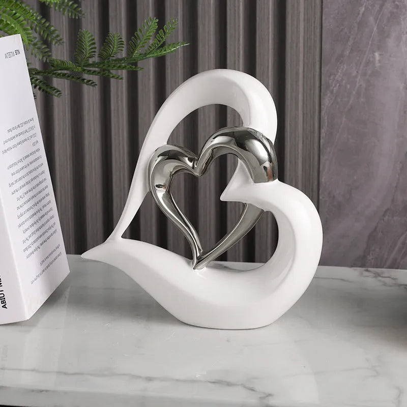 Modern white porcelain love heart ornament with a choice of metallic gold, silver and coloured finishes.