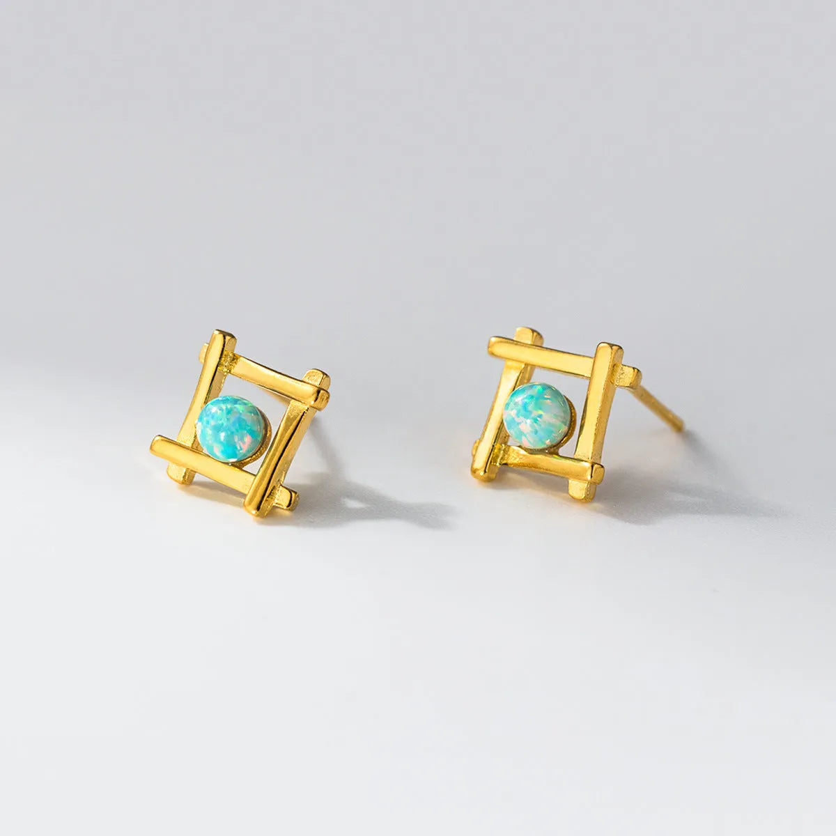 Women's geometric cross quadrangle stud earrings in 925 silver with silver or gold plating