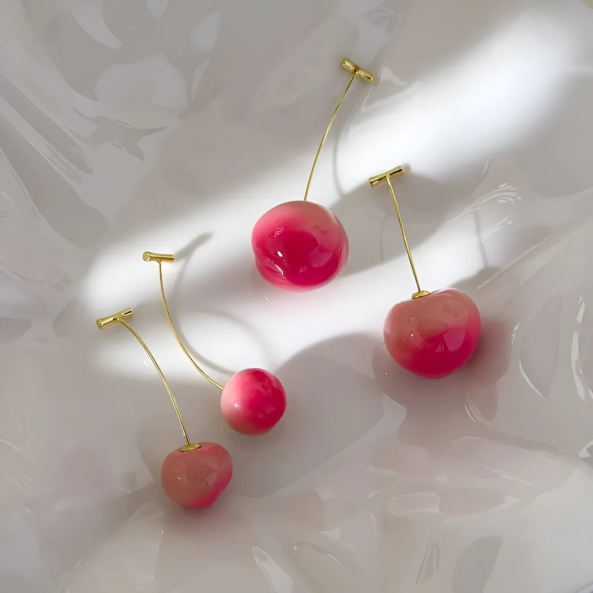 Acrylic peach-shaped earrings with copper findings in two size variations