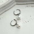 Women's alloy geometric pearl earrings with titanium steel posts