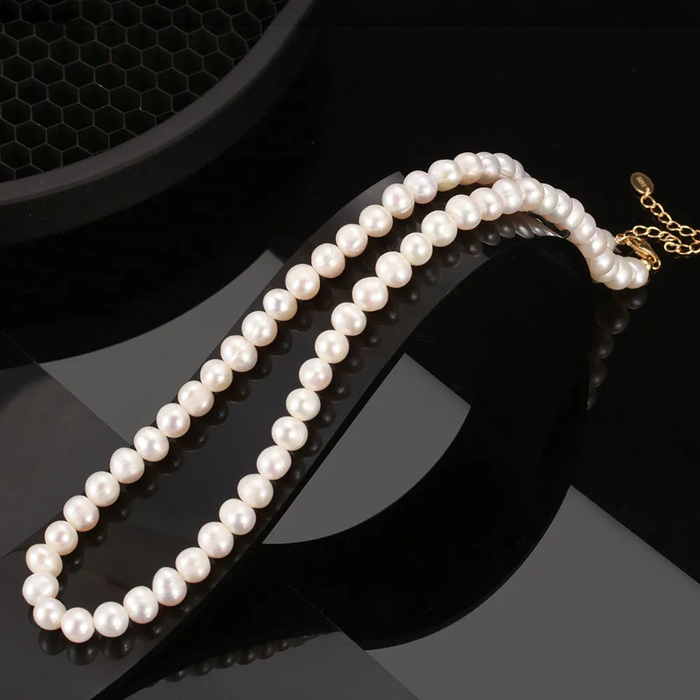 Adjustable sterling silver necklace with 6-7mm freshwater pearl pendant