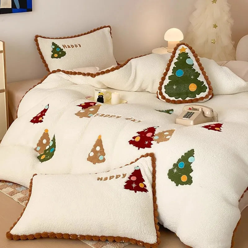 Bright yellow four-piece bedding set with cartoon Christmas tree pattern, including sheet, quilt cover and pillowcases