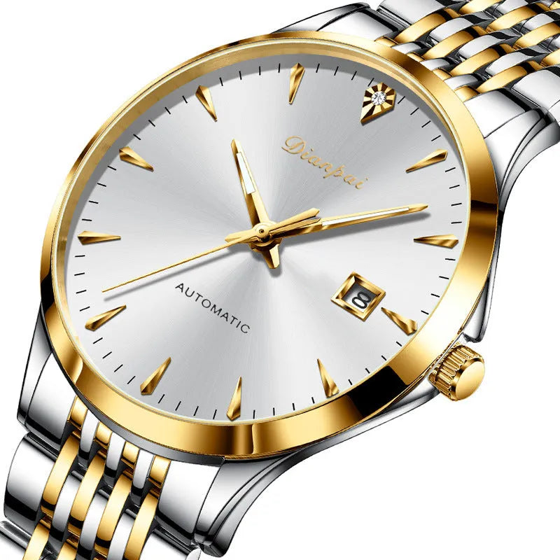Men's simple dial automatic watch with stainless steel bracelet on a wrist.