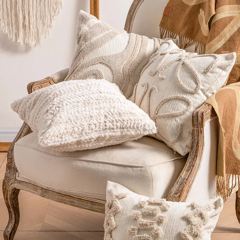 Knitted striped pillow cover with decorative tassel edging in a choice of six patterns.