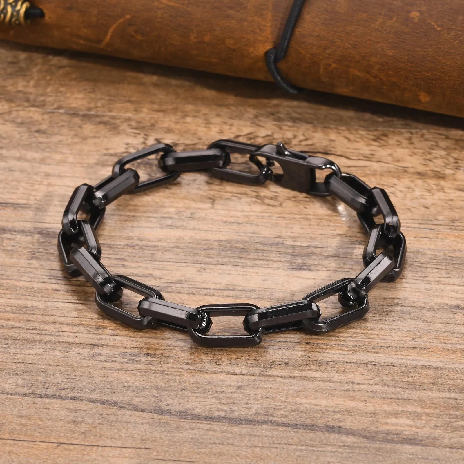 Titanium steel men's bracelet with square chain links in steel, gold, black, or retro finish.
