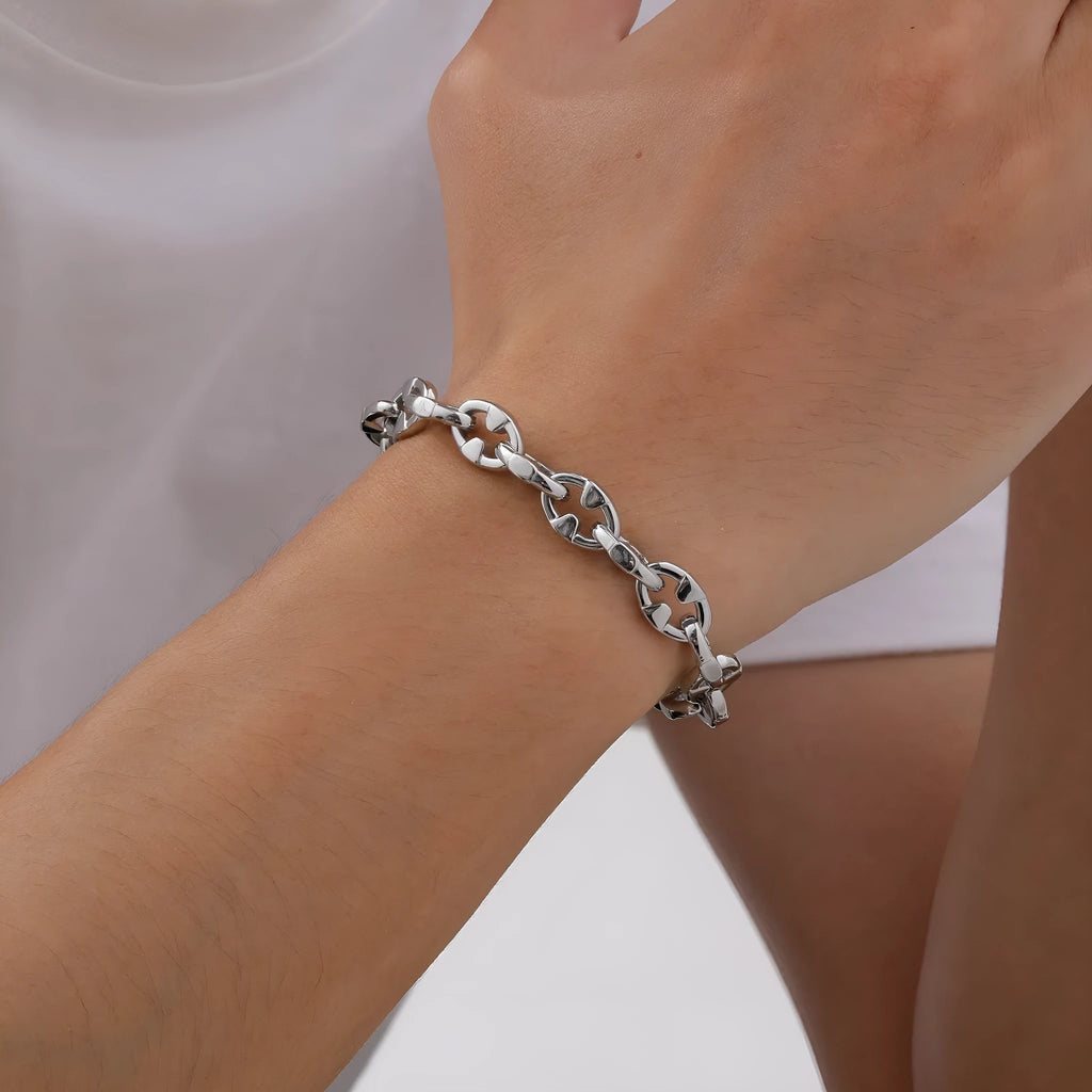 Handmade thick stainless steel chain bracelet with geometric links and a clasp, shown in a steel colour.