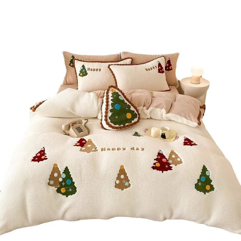 Bright yellow four-piece bedding set with cartoon Christmas tree pattern, including sheet, quilt cover and pillowcases