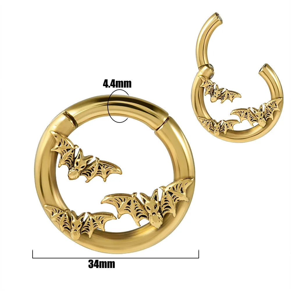 A pair of silver fashion earrings with a raised totem pattern, shown in one of 15 available electroplated colour finishes.