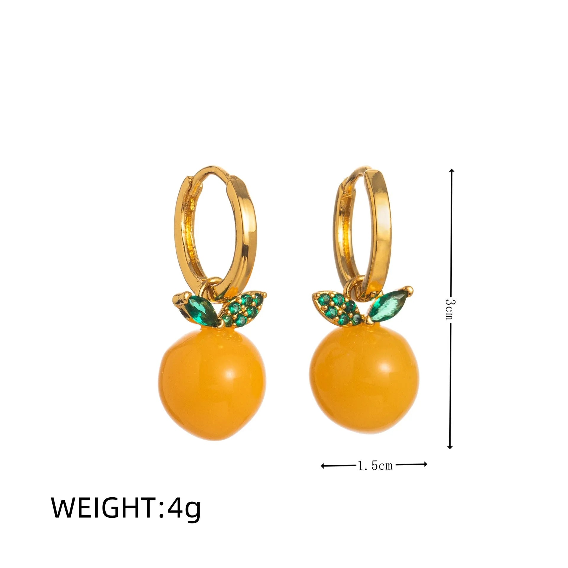 Gold plated fruit and vegetable design earrings showing carrot, orange and blueberry styles