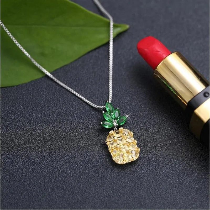 Silver plated geometric pineapple diamond necklace for women with copper white gold plating.