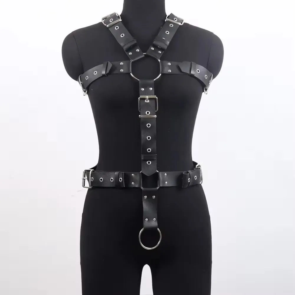 Thin black imitation leather waist belt with a patent finish and pin buckle closure.