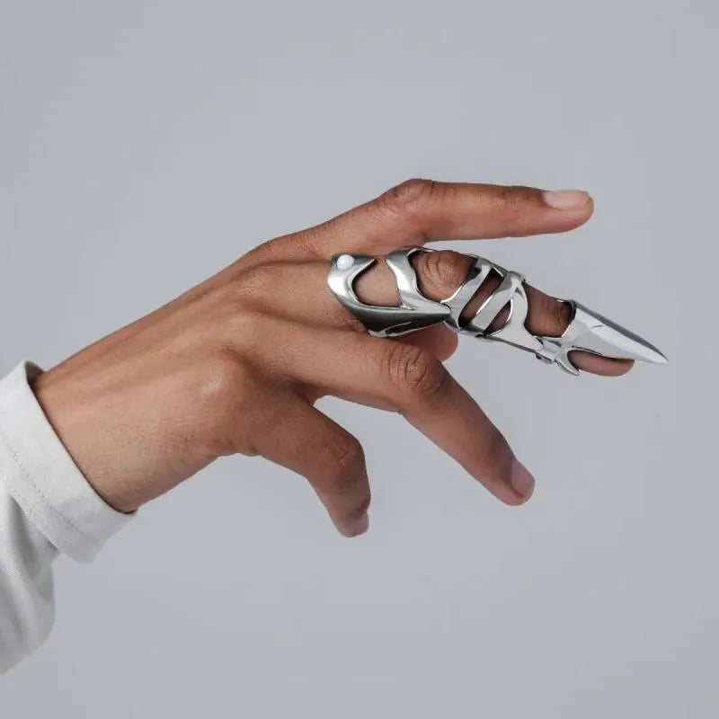 Silver punk armour finger cover ring with alloy construction and standard sizing