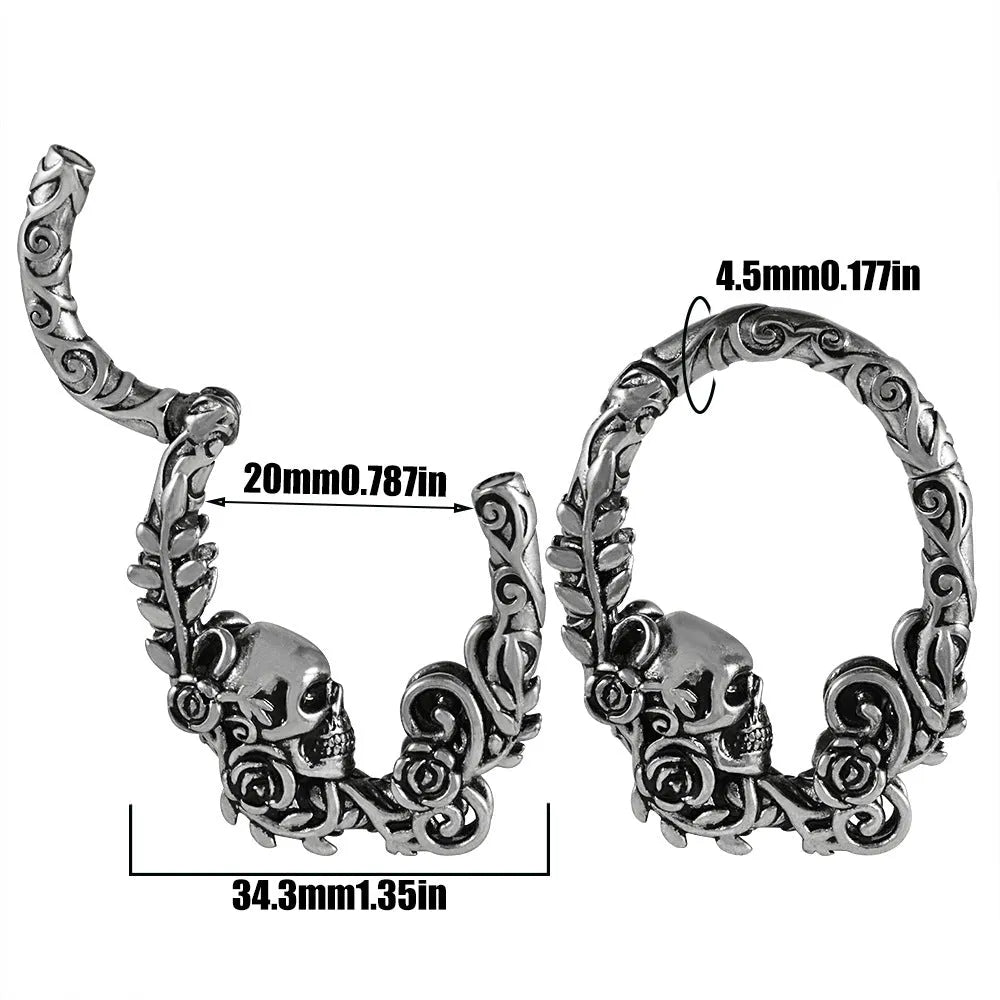 A pair of silver fashion earrings with a raised totem pattern, shown in one of 15 available electroplated colour finishes.