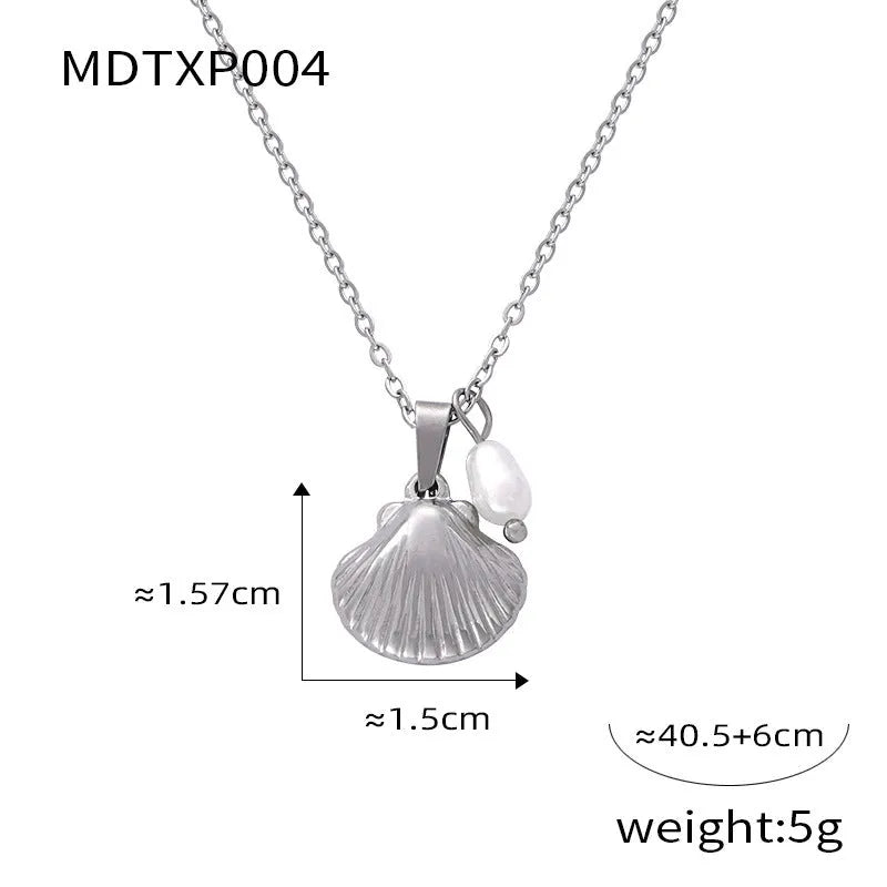 French vintage shell pendant necklace with freshwater pearl bead detail on O-chain