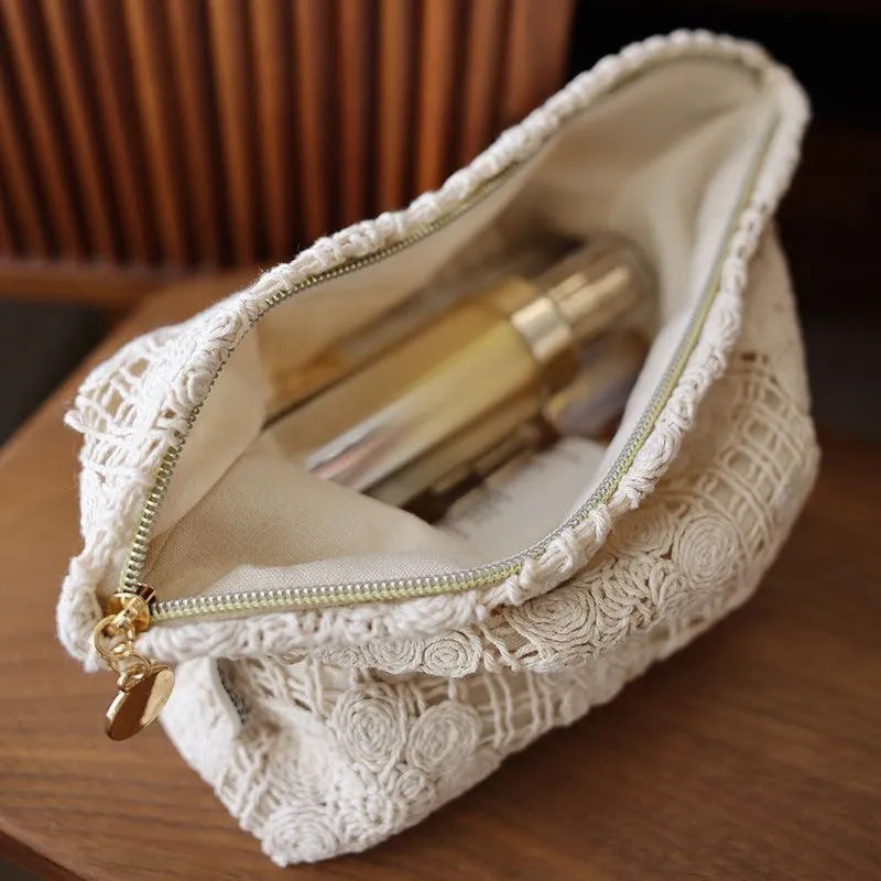 Handmade corduroy cosmetic bag with crocheted hollow flower pattern and ethnic embroidery