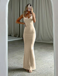 Milk silk backless sling dress with spaghetti straps in champagne colour