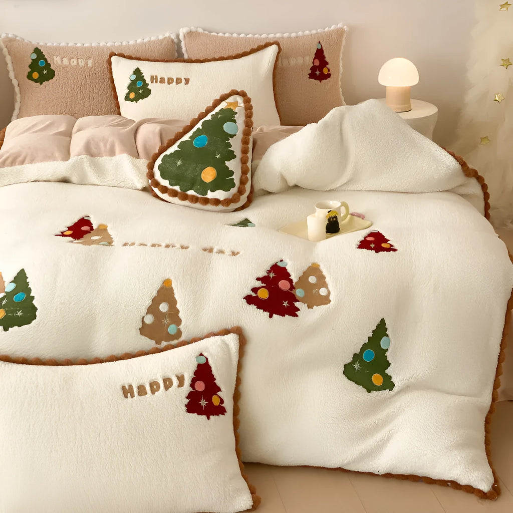 Bright yellow four-piece bedding set with cartoon Christmas tree pattern, including sheet, quilt cover and pillowcases