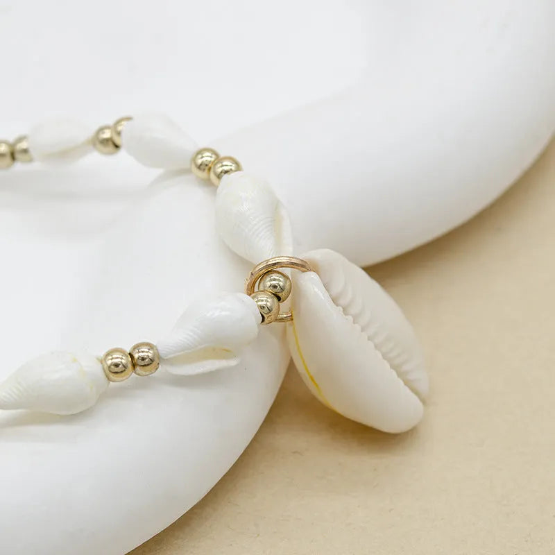 White electroplated conch shell bead necklace with mother pearl shellfish pendant