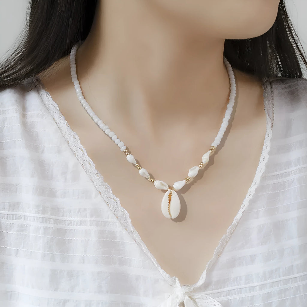 White electroplated conch shell bead necklace with mother pearl shellfish pendant
