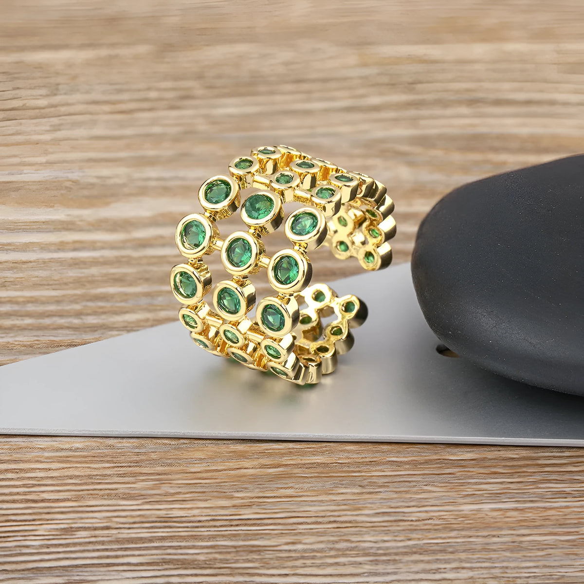 Copper wide band ring with 18K gold plating and full green zircon stones