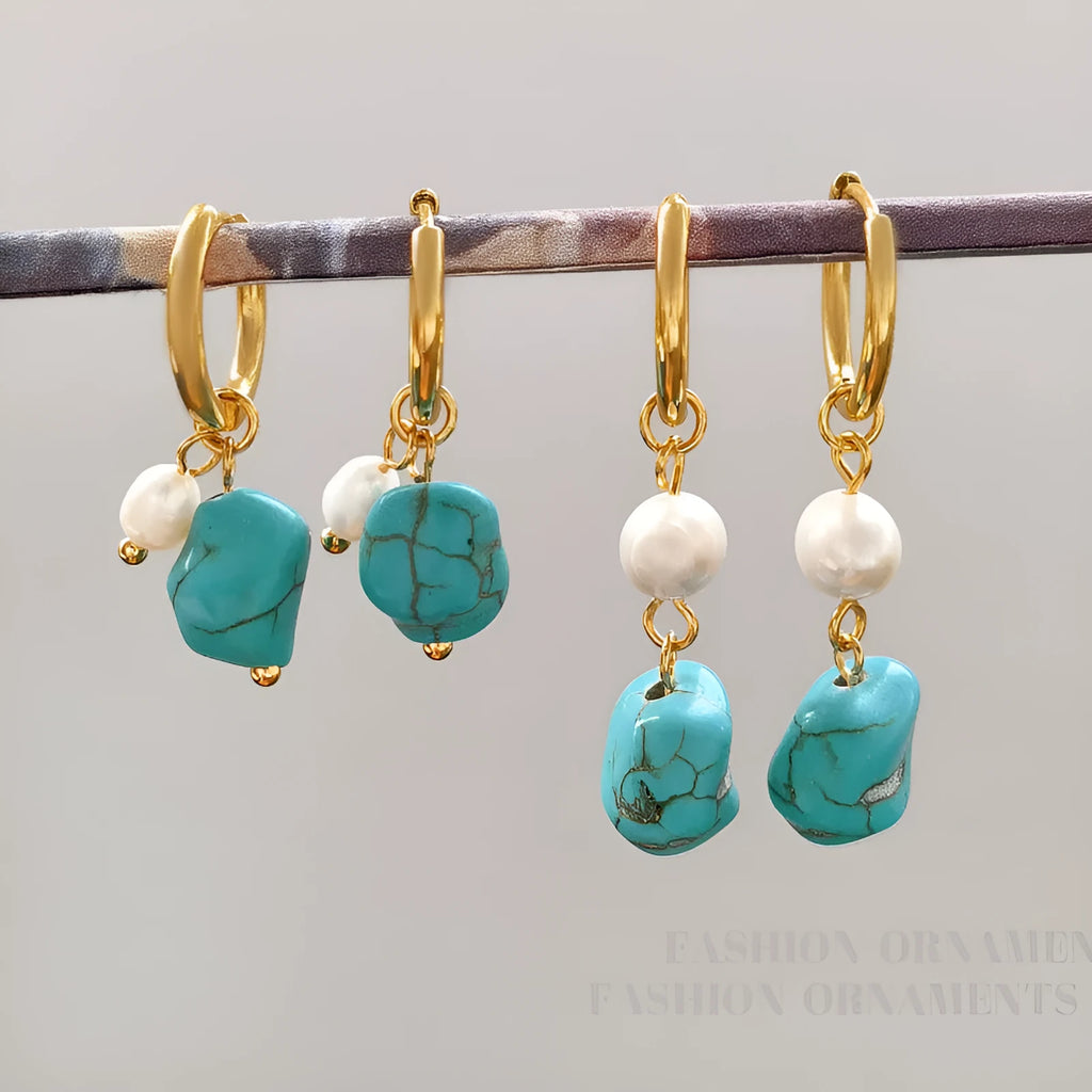 A pair of geometric copper earrings with irregular turquoise stones and cultured pearls