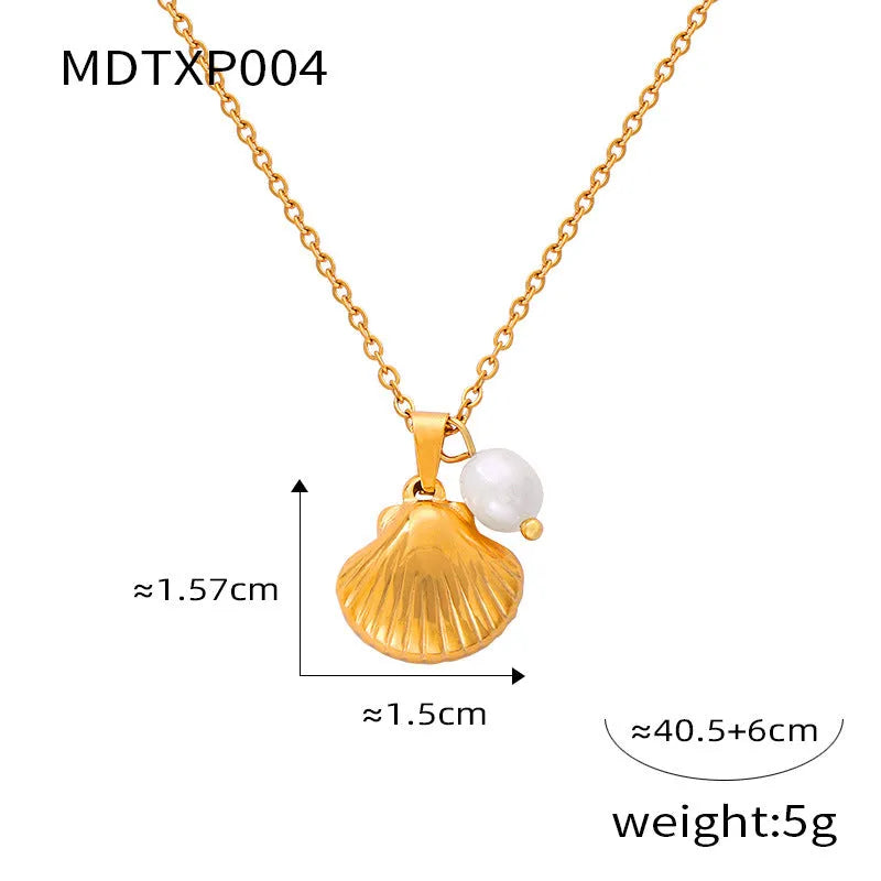 French vintage shell pendant necklace with freshwater pearl bead detail on O-chain