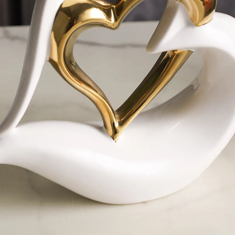 Modern white porcelain love heart ornament with a choice of metallic gold, silver and coloured finishes.