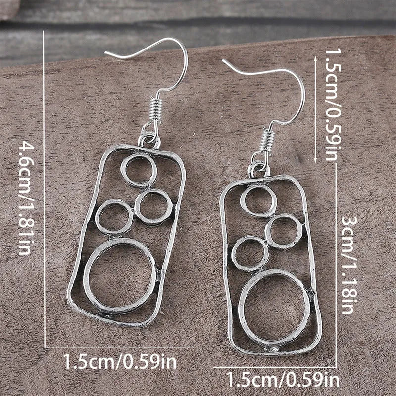 Geometric round ring earrings with irregular square details in antique silver zinc alloy