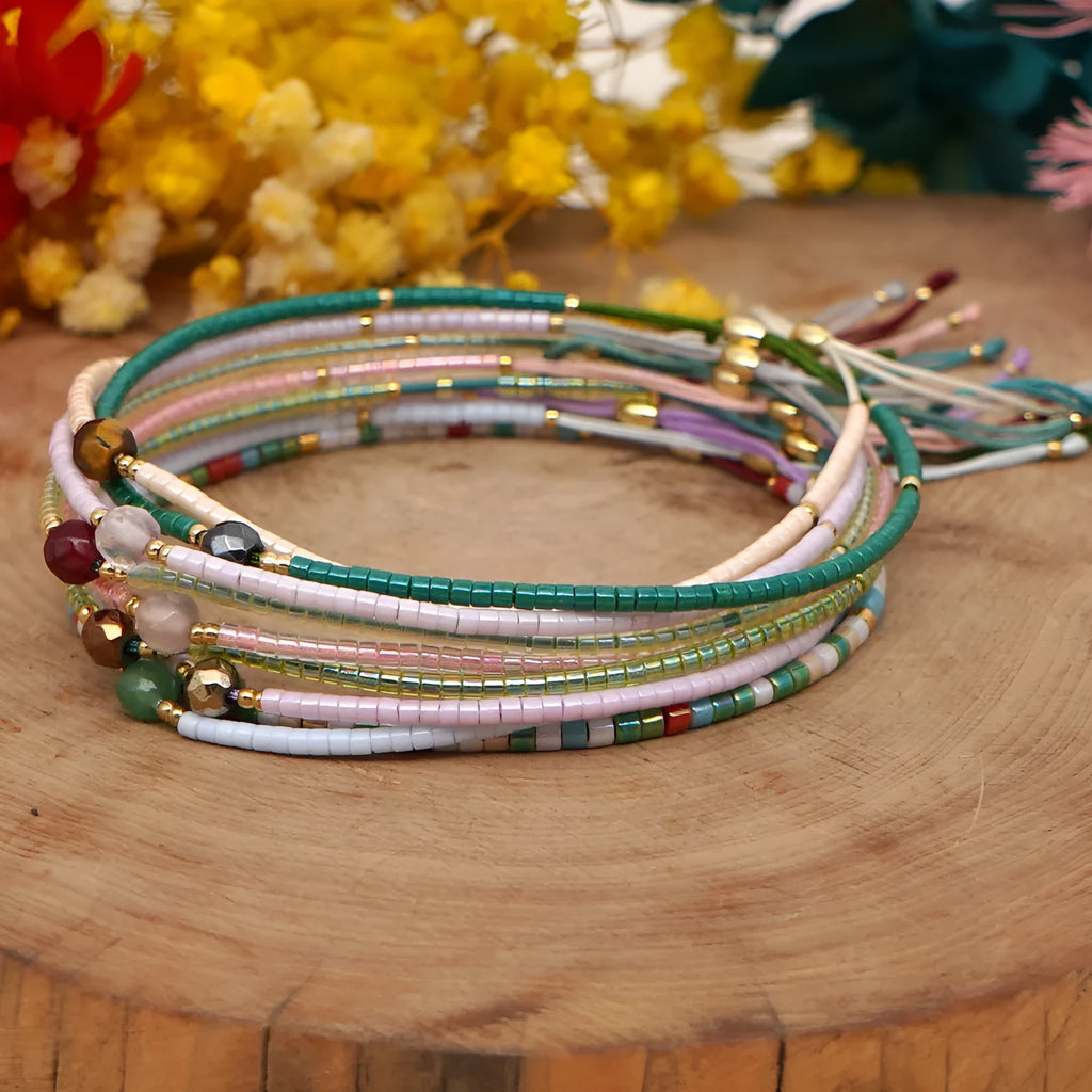 Handmade women's Bohemian bracelet with colourful glass beads and a central lucky stone bead.