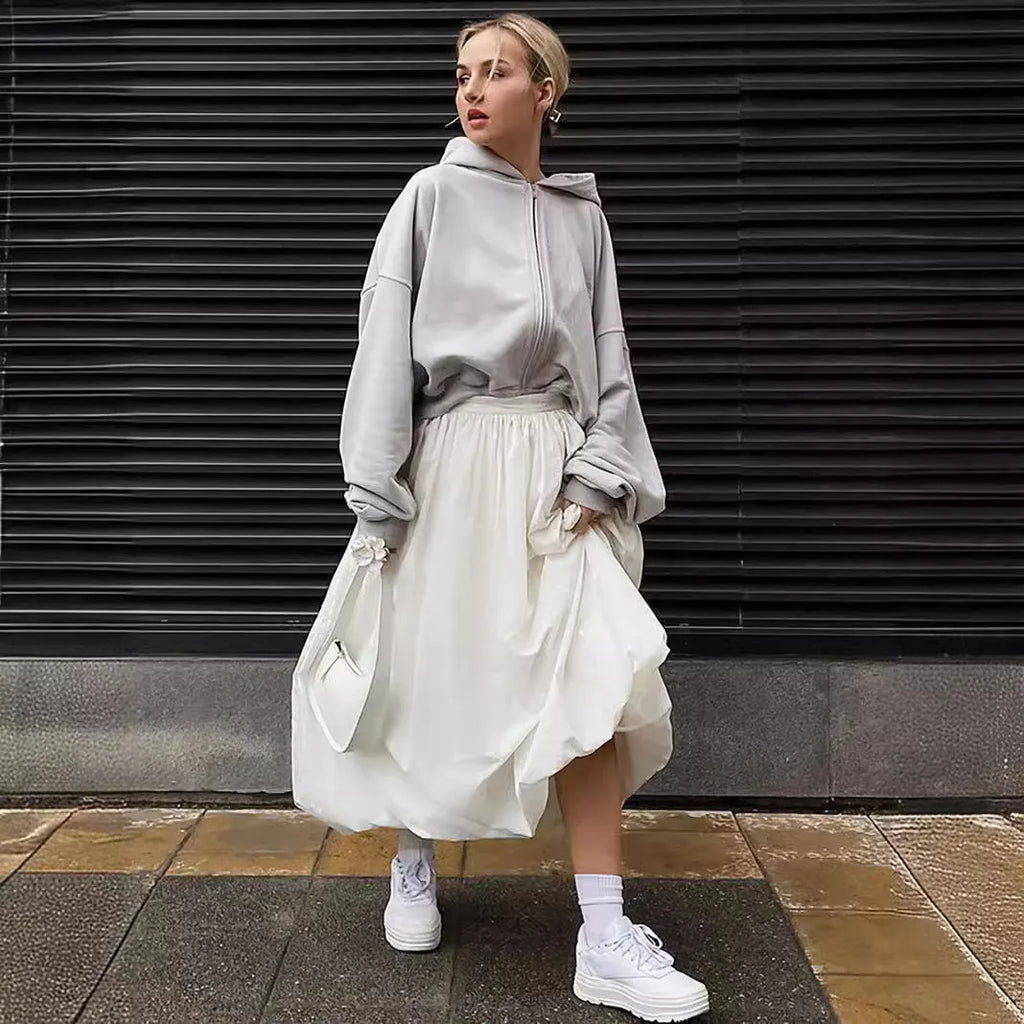 Women's solid colour long cotton skirt in black or white for casual commuting wear