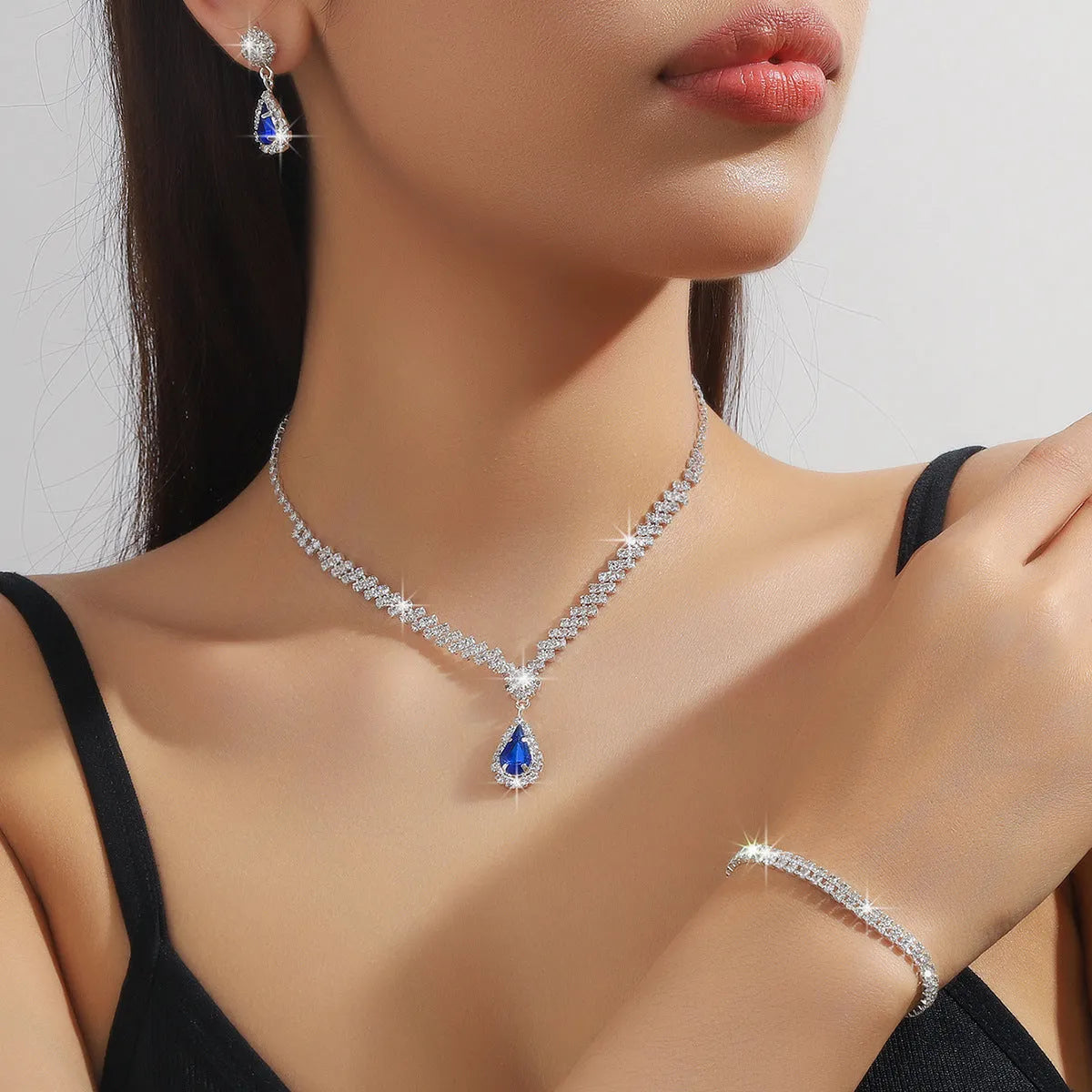 Claw chain necklace and earrings set with water drop rhinestone pendants in multiple colour options