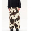 Men's straight-leg trousers with American retro cows pattern showing button-fly opening and straight-leg design
