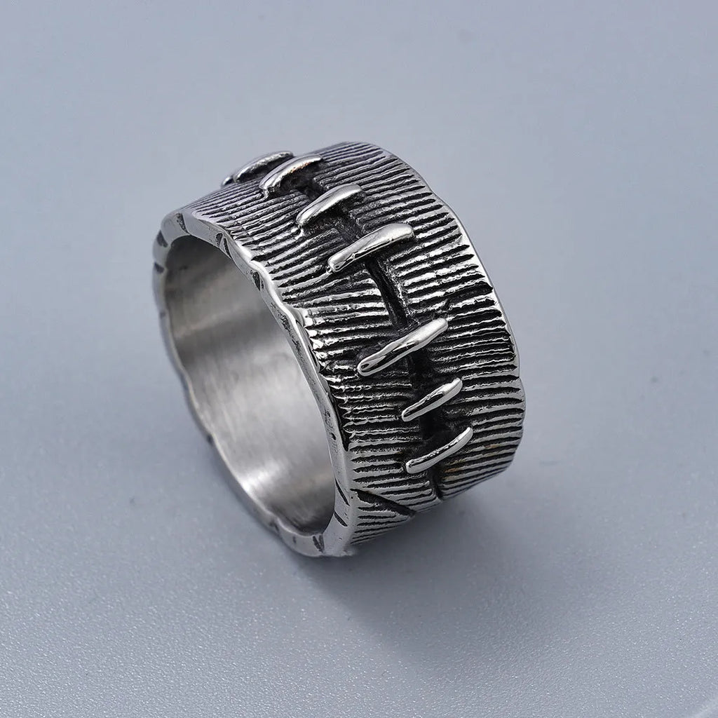Titanium steel geometric double ring with U-shape, stitched pattern, and retro dark colour