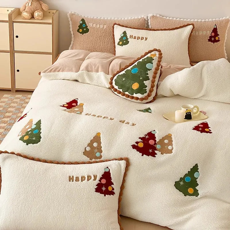 Bright yellow four-piece bedding set with cartoon Christmas tree pattern, including sheet, quilt cover and pillowcases