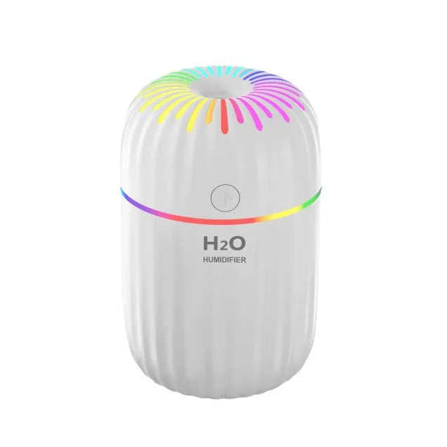 Mini animal-shaped USB humidifier with sterilisation function in green, pink, or white colours