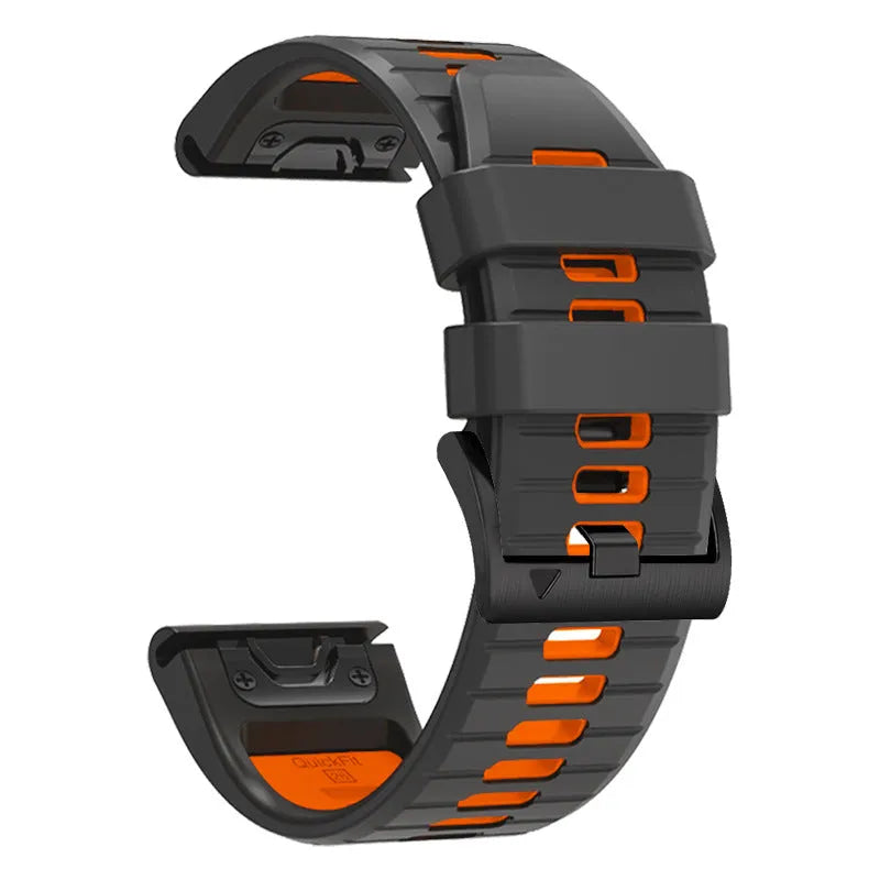 Two-tone quick release silicone watch strap for Garmin Fenix smartwatch on a grey background.