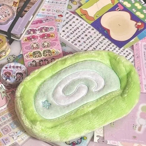 Swiss roll cake plush pencil box in velvet material with Korean style design for stationery storage