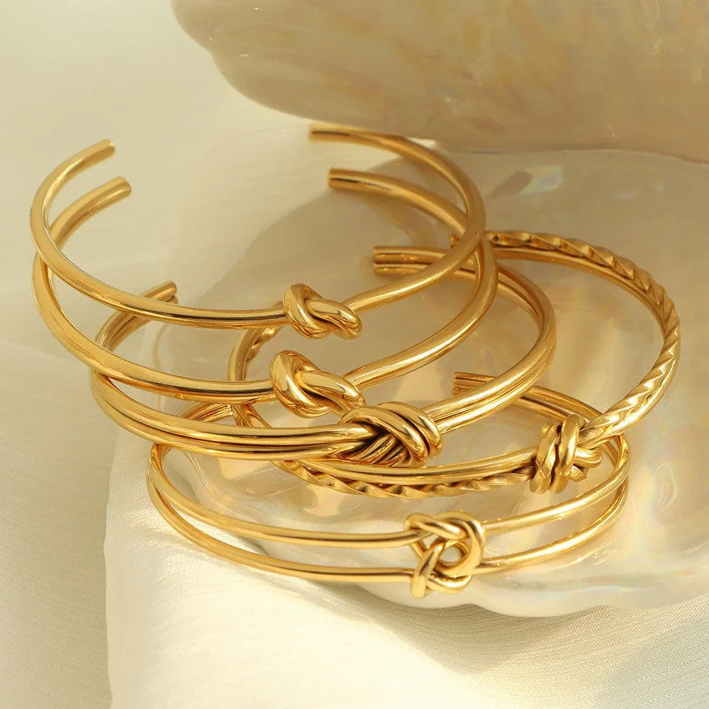 Women's adjustable C-shaped open bracelet with double-layer knotted design in gold or silver finish