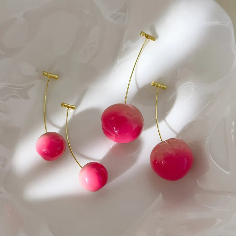 Acrylic peach-shaped earrings with copper findings in two size variations