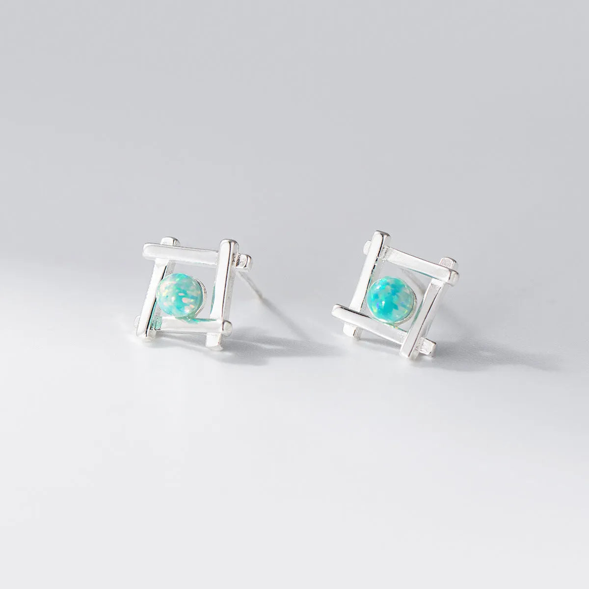 Women's geometric cross quadrangle stud earrings in 925 silver with silver or gold plating