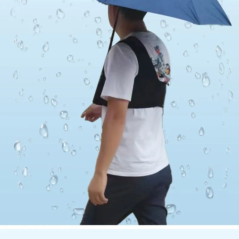 Black portable umbrella holder with shoulder strap for hands-free use with a manual umbrella.