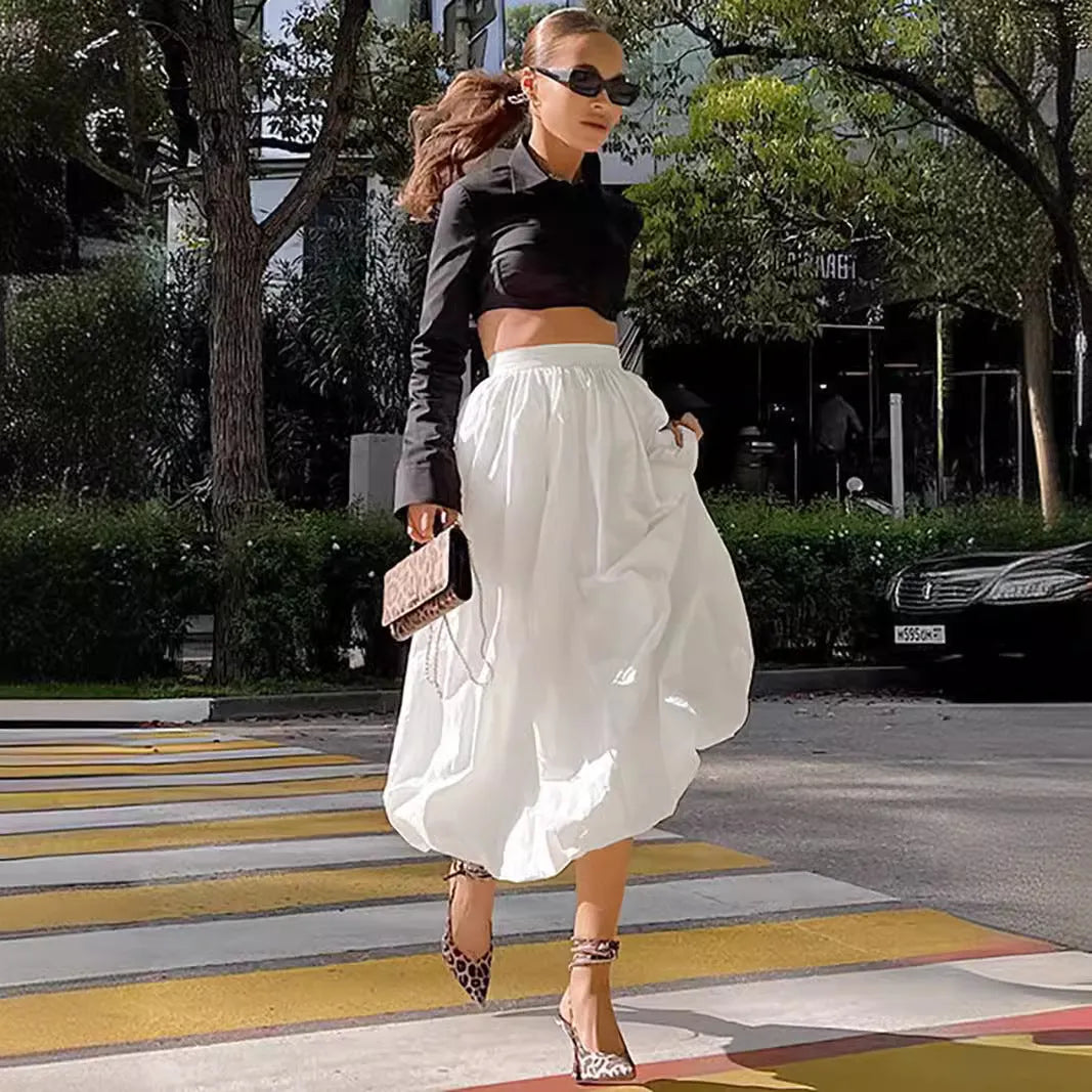 Women's solid colour long cotton skirt in black or white for casual commuting wear