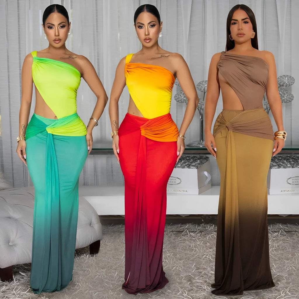 Women's gradient colour cross-shoulder long summer dress on a model, showing the oblique shoulder and one-step skirt design.